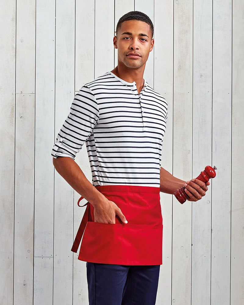 Man Wearing A Red Short Bar Apron