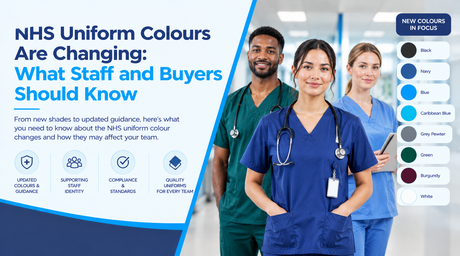 Healthcare professionals wearing blue and green scrubs in a hospital corridor