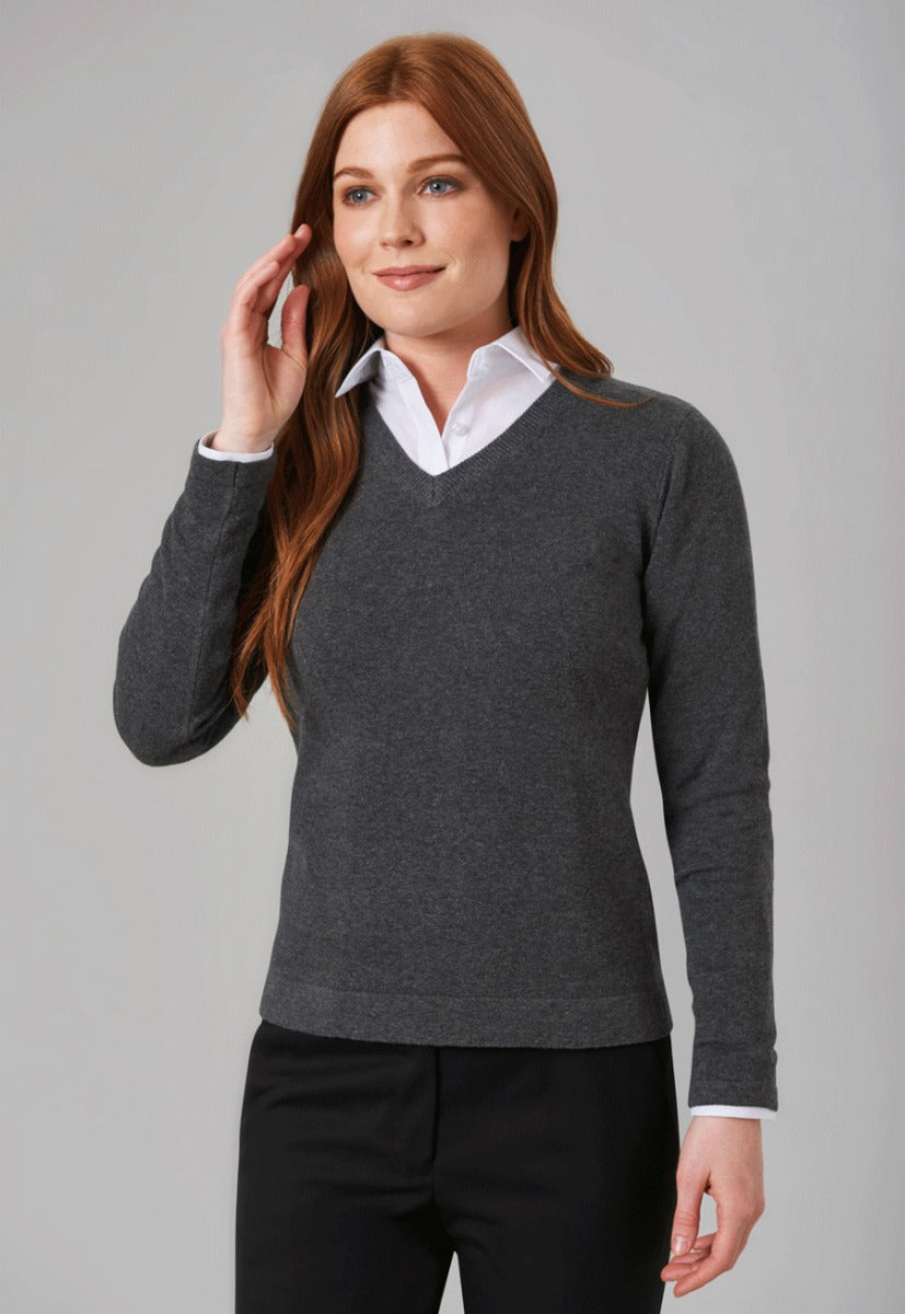 Woman Wearing A Charcoal Grey V Neck Jumper