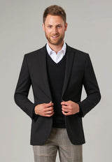 Man Wearing A V-Neck Jumper under a Suit Jacket
