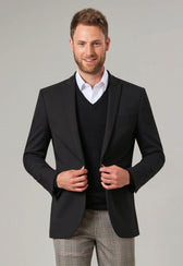 Man Wearing A V-Neck Jumper under a Suit Jacket