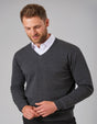 Man Wearing A Charcoal Grey V-Neck Jumper