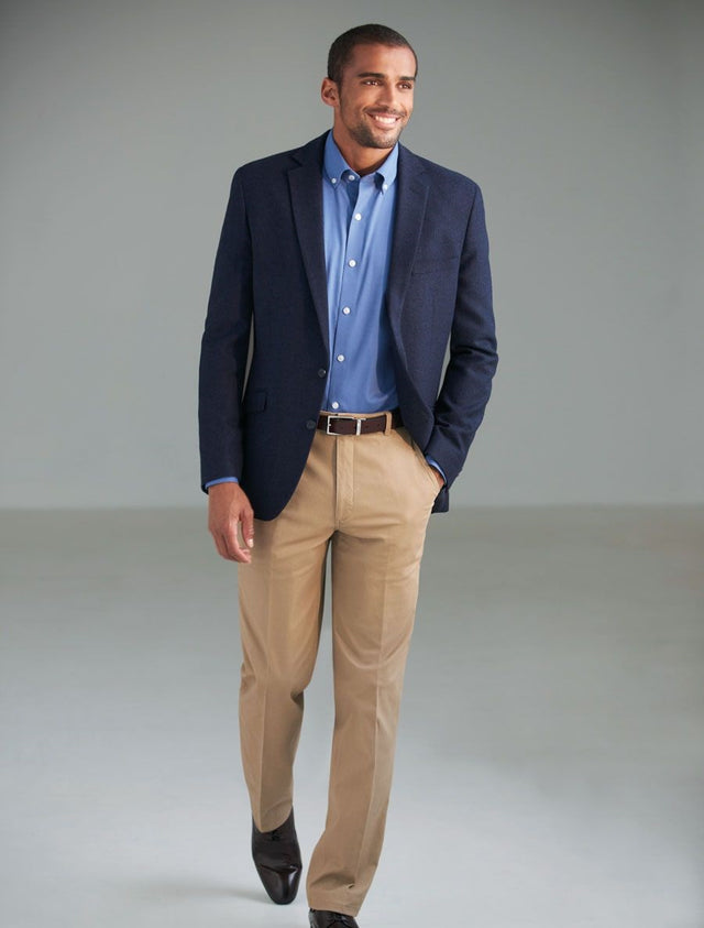 Man Wearing A navy Blazer And Beige Chino Trousers