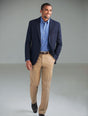 Man Wearing A navy Blazer And Beige Chino Trousers