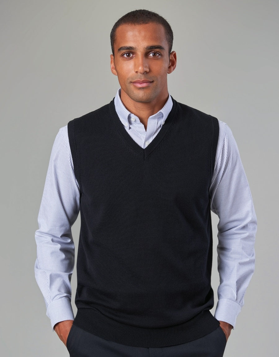 Man Wearing A Navy V-Neck Sleeveless Jumper