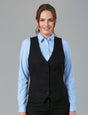 Woman Wearing A Black Waistcoat With A Light Blue Short Sleeve Blouse