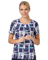 Woman In A Comfort Stretch Blouse With A Paint Print Design