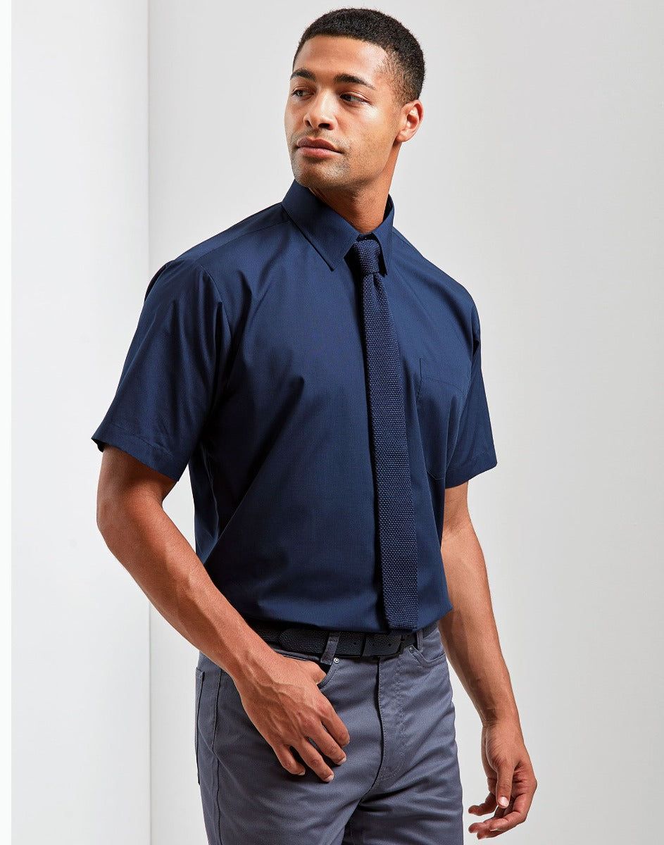 Man Wearing Navy Short Sleeve Poplin Shirt