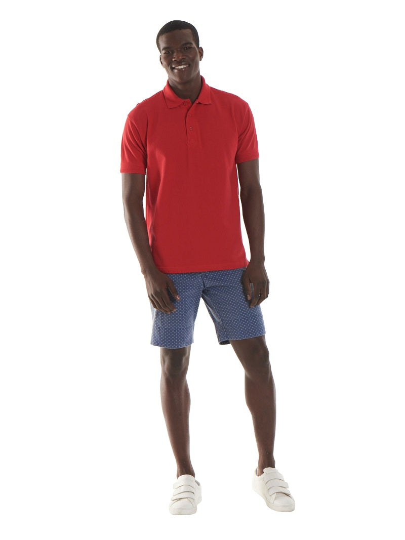 Man Wearing A Heavyweight Cotton Short Sleeve Polo Shirt