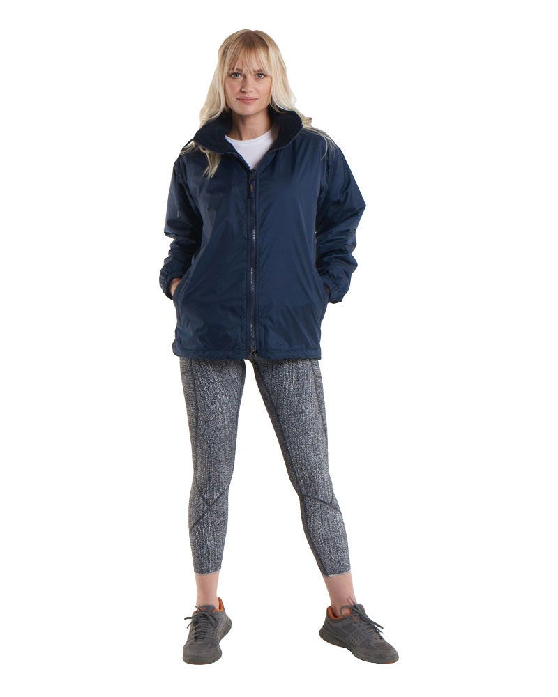 Woman Wearing A Navy Blue Reversible Fleece Jacket
