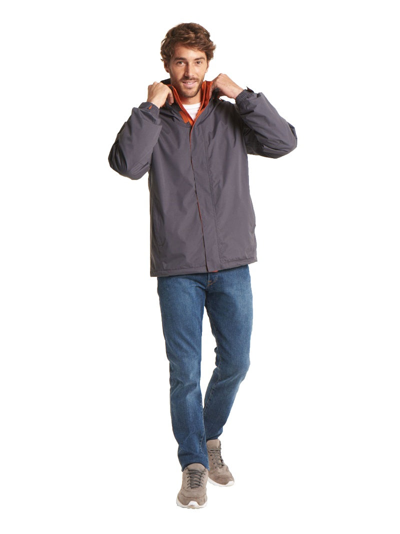 Man Wearing a Grey Fleece Lined Waterproof Jacket